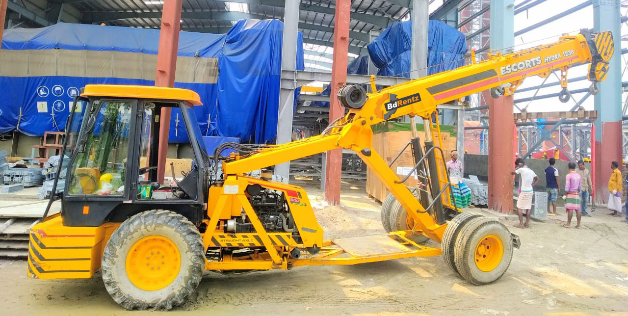 heavy construction equipment escorts hydra crane in bangladesh